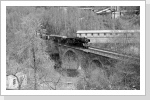 50 3694 mit dem Dg 54309 auf der Muldebrücke am Wismut Anschluß Poppenwald April 87