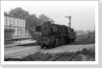 50 3652 setzt sich an ihren Güstrower Nahgüterzug in Neustadt/Dosse Juli 85