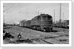 120 292 passiert den Bahnhof Wittenberge auf dem Weg nach Süden März 87